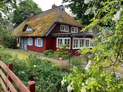 Ein Garten an der Unterkunft Ellas Kate Schwalbennest