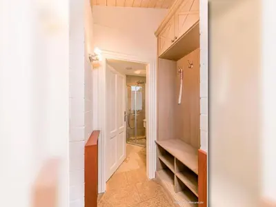Ein Bett oder Betten in einem Zimmer der Unterkunft Strandhaus 