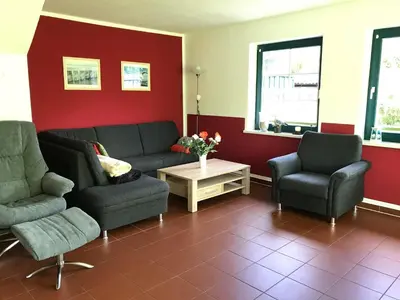 Ein Sitzbereich in der Unterkunft Ferienhaus Möwe - b49721