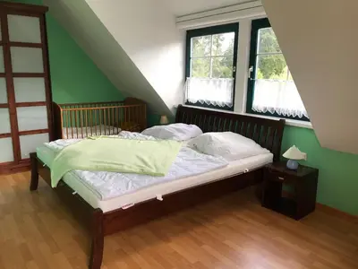 Ein Bett oder Betten in einem Zimmer der Unterkunft Ferienhaus Möwe - b49721