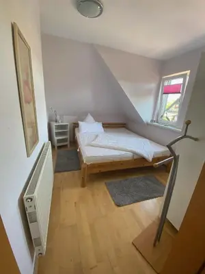 Ein Bett oder Betten in einem Zimmer der Unterkunft Ferienwohnung Diana