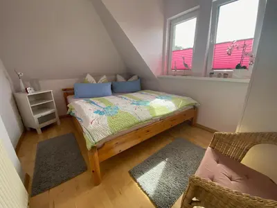 Ein Bett oder Betten in einem Zimmer der Unterkunft Ferienwohnung Diana