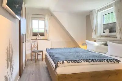 Ein Bett oder Betten in einem Zimmer der Unterkunft Sandbank No 4