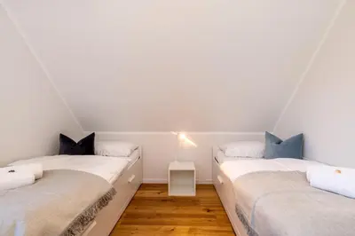 Ein Bett oder Betten in einem Zimmer der Unterkunft Zingstgeflüster