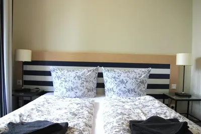 Ein Bett oder Betten in einem Zimmer der Unterkunft Wohnung 615 Sonnenterrasse Seebrücke