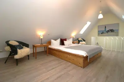 Ein Bett oder Betten in einem Zimmer der Unterkunft Lange Straße Likedeeler