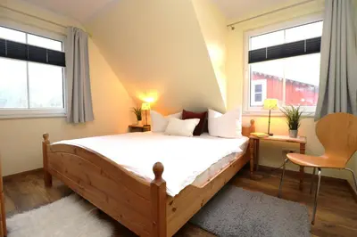 Ein Bett oder Betten in einem Zimmer der Unterkunft Lange Straße Likedeeler