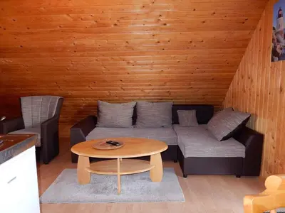 Ein Sitzbereich in der Unterkunft Apartment in Fuhlendorf 2747