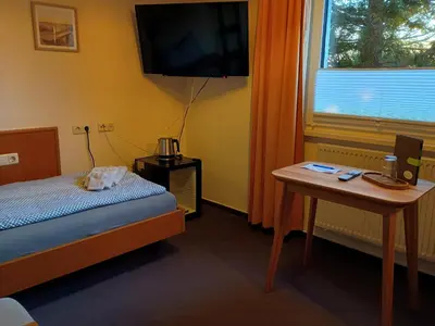 Ein Bett oder Betten in einem Zimmer der Unterkunft Pension Stocker