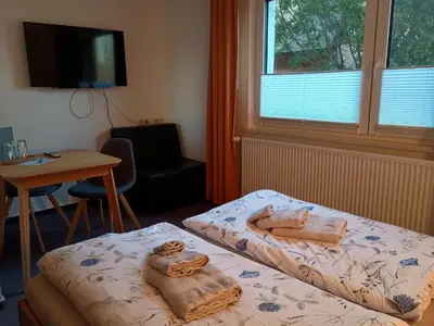Ein Bett oder Betten in einem Zimmer der Unterkunft Pension Stocker