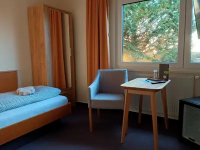 Ein Bett oder Betten in einem Zimmer der Unterkunft Pension Stocker