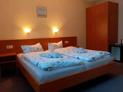 Ein Bett oder Betten in einem Zimmer der Unterkunft Pension Stocker