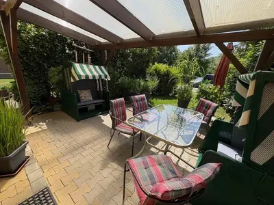 Ein Garten an der Unterkunft Ferienhaus am Saaler Bodden