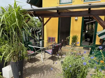 Ein Garten an der Unterkunft Ferienhaus am Saaler Bodden