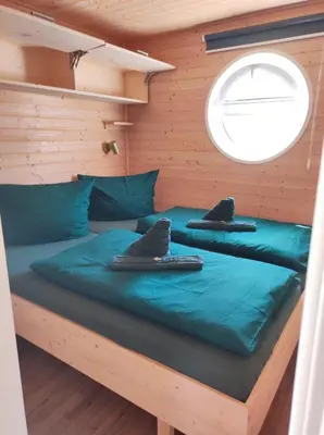 Ein Bett oder Betten in einem Zimmer der Unterkunft Bryonia