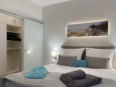 Ein Bett oder Betten in einem Zimmer der Unterkunft Ferienwohnung Kleine Auszeit - b50593