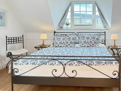 Ein Bett oder Betten in einem Zimmer der Unterkunft StrandAnker