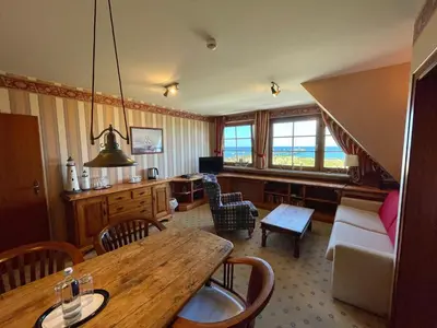 Ein Sitzbereich in der Unterkunft Moby Dick Hotel & Ferienwohnungen