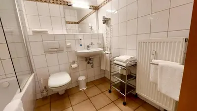 Ein Badezimmer in der Unterkunft Moby Dick Hotel & Ferienwohnungen