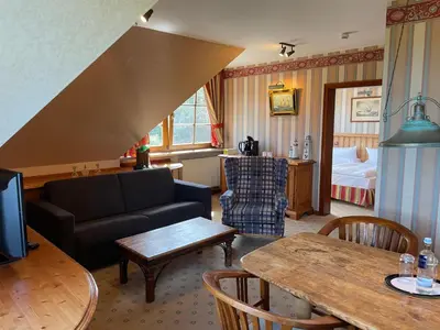 Ein Sitzbereich in der Unterkunft Moby Dick Hotel & Ferienwohnungen