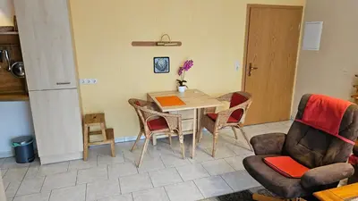 Ein Sitzbereich in der Unterkunft Ferienunterkünfte Haus Hanni