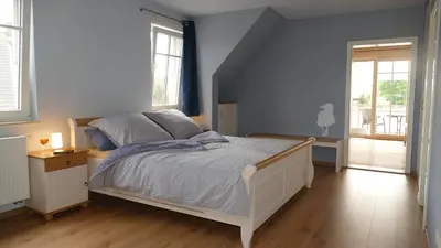 Ein Bett oder Betten in einem Zimmer der Unterkunft Adele
