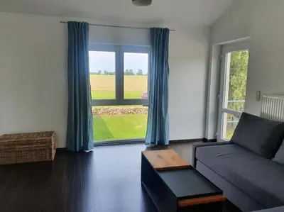 Ein Sitzbereich in der Unterkunft Ferienwohnung MaLaMaBu am Kitespot Saal Ostsee