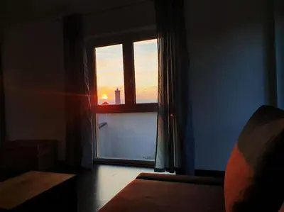 Ein Bett oder Betten in einem Zimmer der Unterkunft Ferienwohnung MaLaMaBu am Kitespot Saal Ostsee