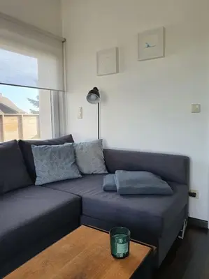 Ein Sitzbereich in der Unterkunft Ferienwohnung MaLaMaBu am Kitespot Saal Ostsee