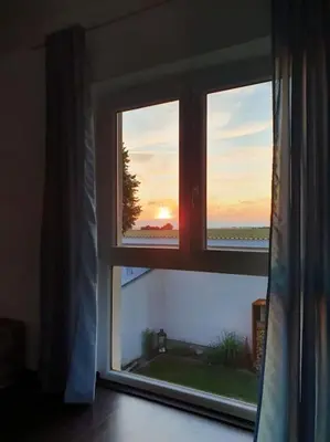 Blick auf den Sonnenuntergang/Sonnenaufgang von der Ferienwohnung aus oder aus der Nähe