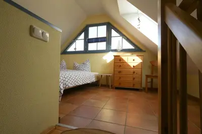 Ein Bett oder Betten in einem Zimmer der Unterkunft Utkiek W5 - Ihr Hafen der Erholung in Zingst