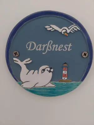 Ein Zertifikat, Auszeichnung, Logo oder anderes Dokument, das in der Unterkunft An de Bäk Darßnest ausgestellt ist
