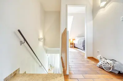 Ein Bett oder Betten in einem Zimmer der Unterkunft Kormoran L6