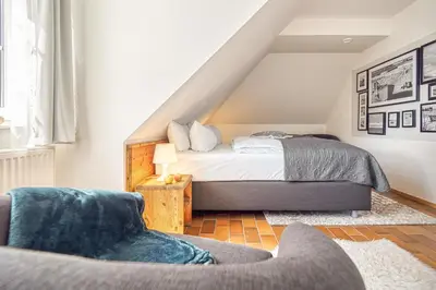 Ein Bett oder Betten in einem Zimmer der Unterkunft Kormoran L6