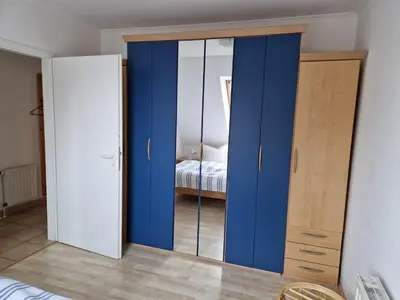 Ein Bett oder Betten in einem Zimmer der Unterkunft Whg 29 1 OG