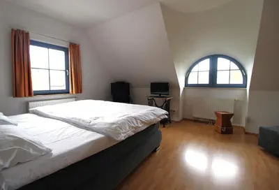 Ein Bett oder Betten in einem Zimmer der Unterkunft An der Sonne