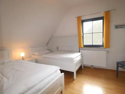 Ein Bett oder Betten in einem Zimmer der Unterkunft An der Sonne