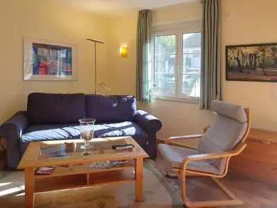 Ein Sitzbereich in der Unterkunft Achtern Darsswald E1