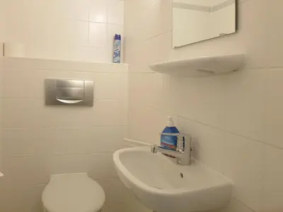Ein Badezimmer in der Unterkunft Achtern Darsswald E1