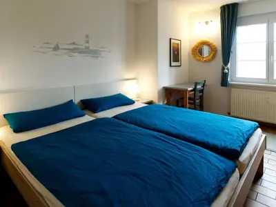 Ein Bett oder Betten in einem Zimmer der Unterkunft Achtern Darsswald G1