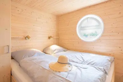 Ein Bett oder Betten in einem Zimmer der Unterkunft Veronica