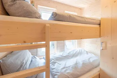 Ein Bett oder Betten in einem Zimmer der Unterkunft Veronica