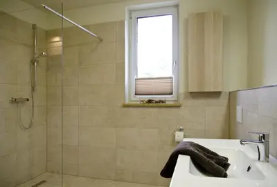 Ein Badezimmer in der Unterkunft Ferienwohnungen Boddenfischer