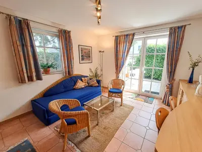 Ein Sitzbereich in der Unterkunft Ferienwohnung Seewolf