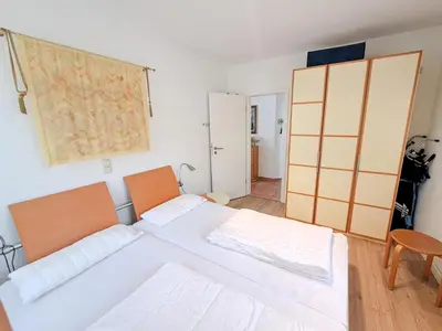 Ein Bett oder Betten in einem Zimmer der Unterkunft Ferienwohnung Seewolf