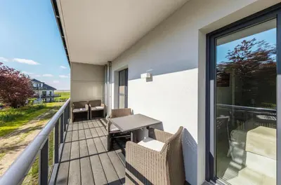 Ein Balkon oder eine Terrasse in der Unterkunft 5 Sterne Ferienwohnung Kroonkieker - Sauna, Fitness, Ostseestrand