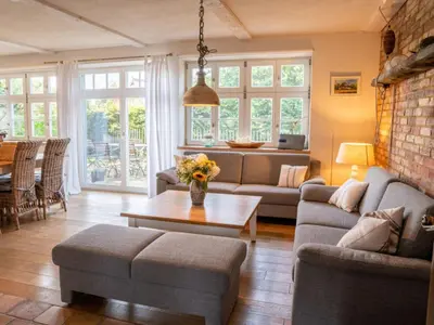 Ein Sitzbereich in der Unterkunft Anchorage Darß Modern retreat