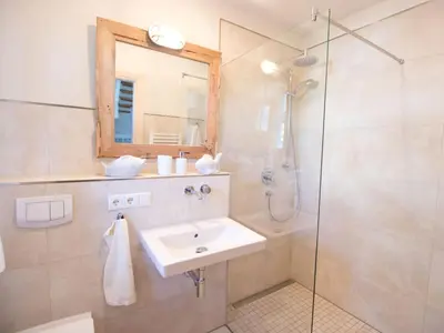 Ein Badezimmer in der Unterkunft Anchorage Darß Modern retreat