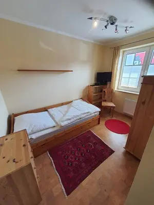 Ein Bett oder Betten in einem Zimmer der Unterkunft Lindenstr 38 Wg 12 