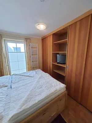 Ein Bett oder Betten in einem Zimmer der Unterkunft Lindenstr 38 Wg 12 